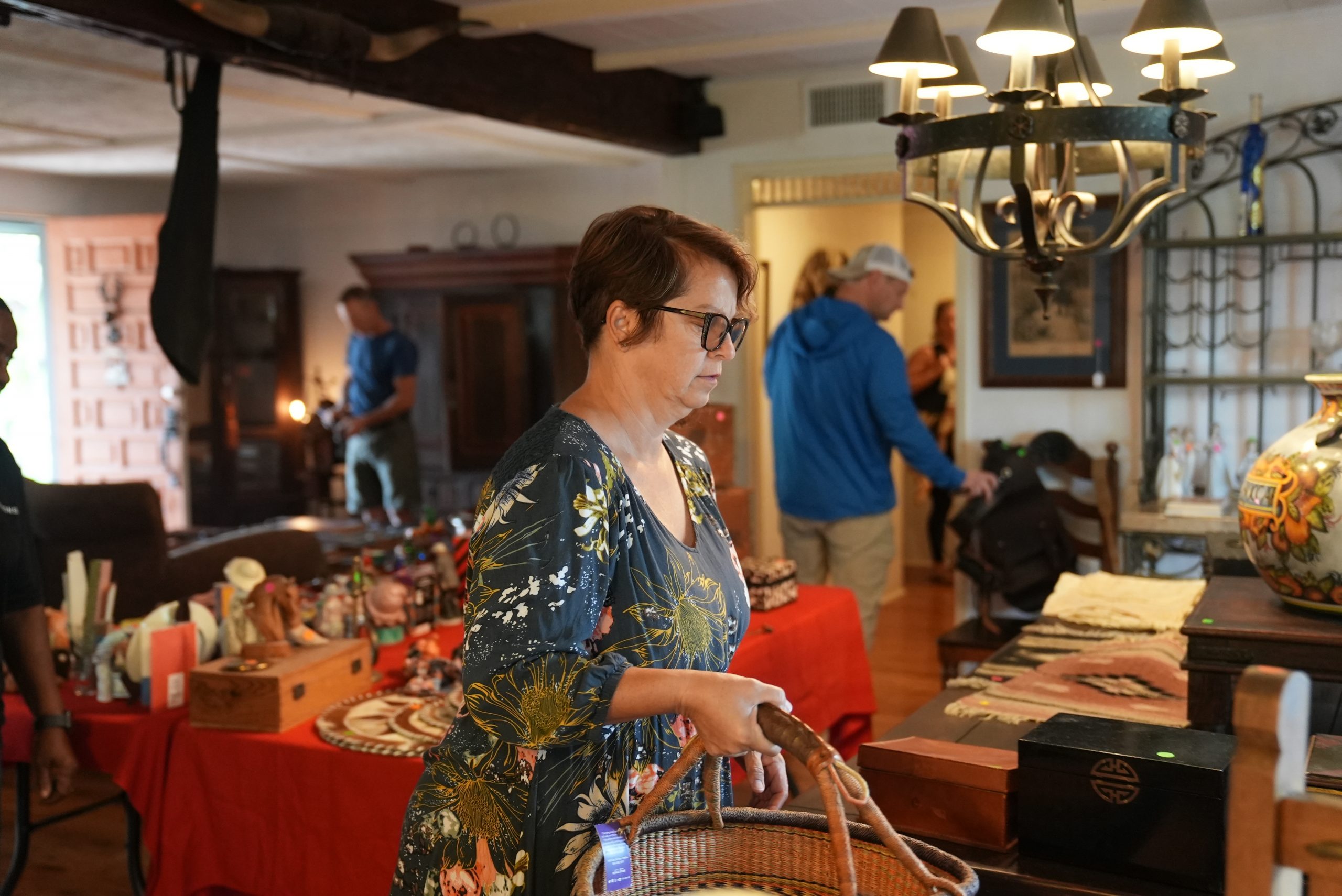 Grasons estate sales customer browsing in house